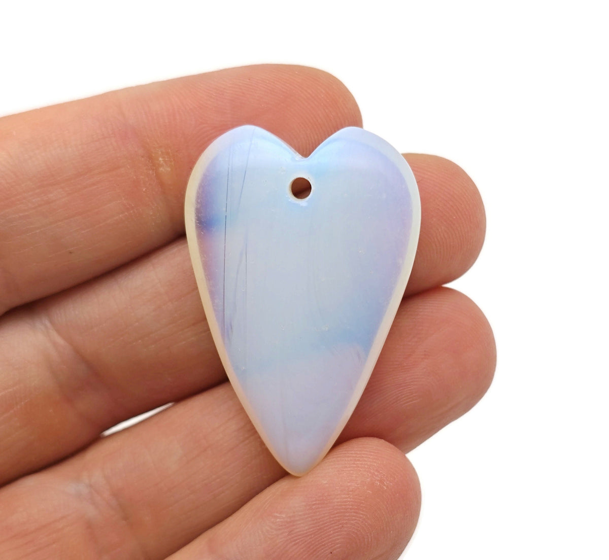 Opalite long heart-shaped love crystal pendant with a smooth, polished gemstone and silver bail, designed for healing and elegance.
