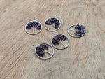 Garnet Tree of Life gemstone pendant from GemstoneGO, featuring intricate design and vibrant red garnet stones.