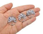 Aquamarine Tree of Life gemstone pendant from GemstoneGO featuring a detailed crystal and metal tree design.