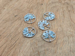 Aquamarine Tree of Life gemstone pendant from GemstoneGO, featuring intricate design and vibrant blue aquamarine gemstones.