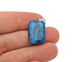 Blue Apatite rectangle crystal pendant from GemstoneGO, showcasing a vibrant blue gemstone with a polished rectangular shape.