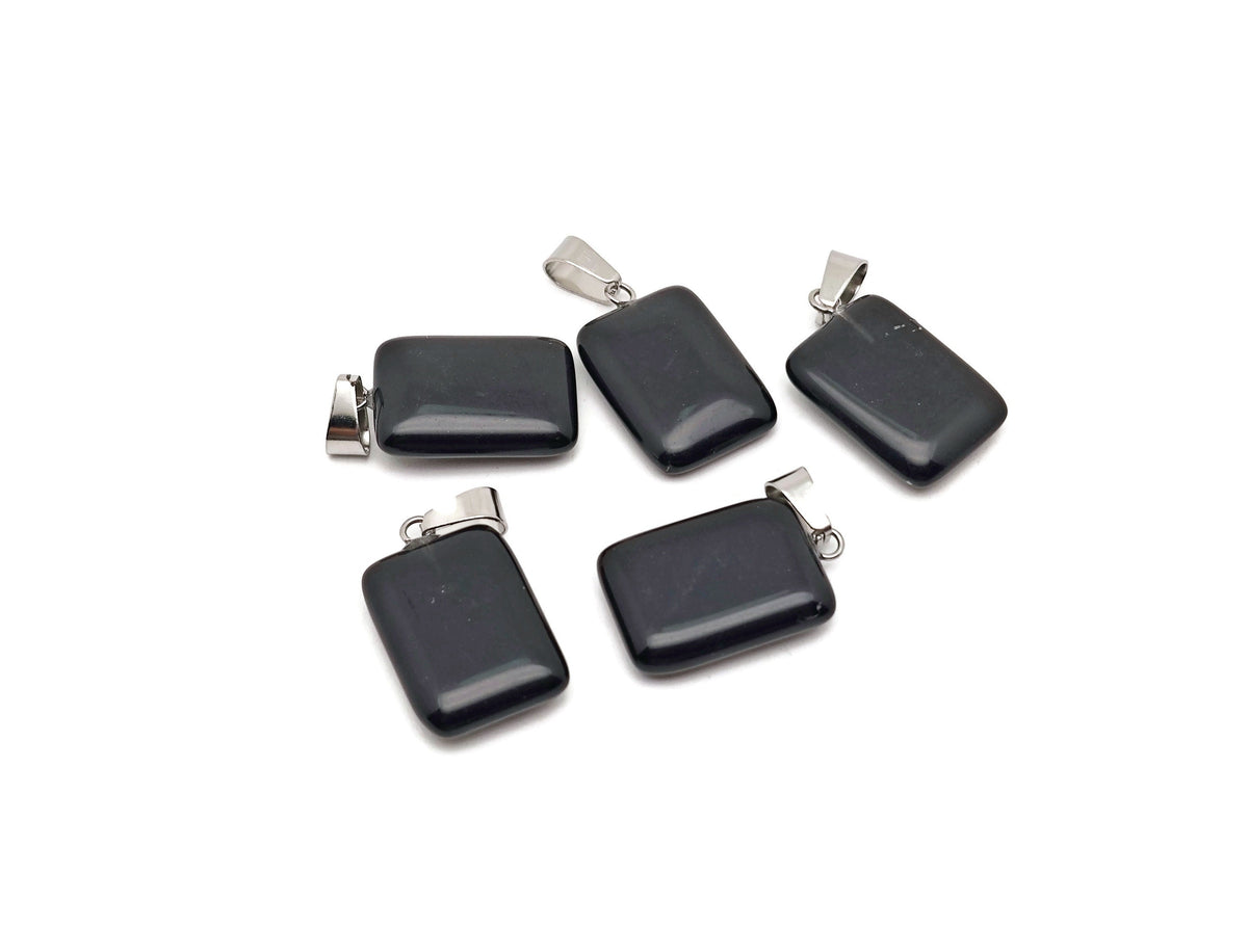 Obsidian rectangle crystal pendant from GemstoneGO, showcasing a polished black gemstone with a smooth rectangular shape.