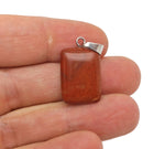 Red Jasper rectangle-shaped crystal pendant from GemstoneGO, showcasing vibrant red gemstone with polished, smooth surface.