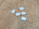 Clear quartz rectangle crystal pendant from GemstoneGO, showcasing a transparent, polished gemstone with a silver bail attachment.