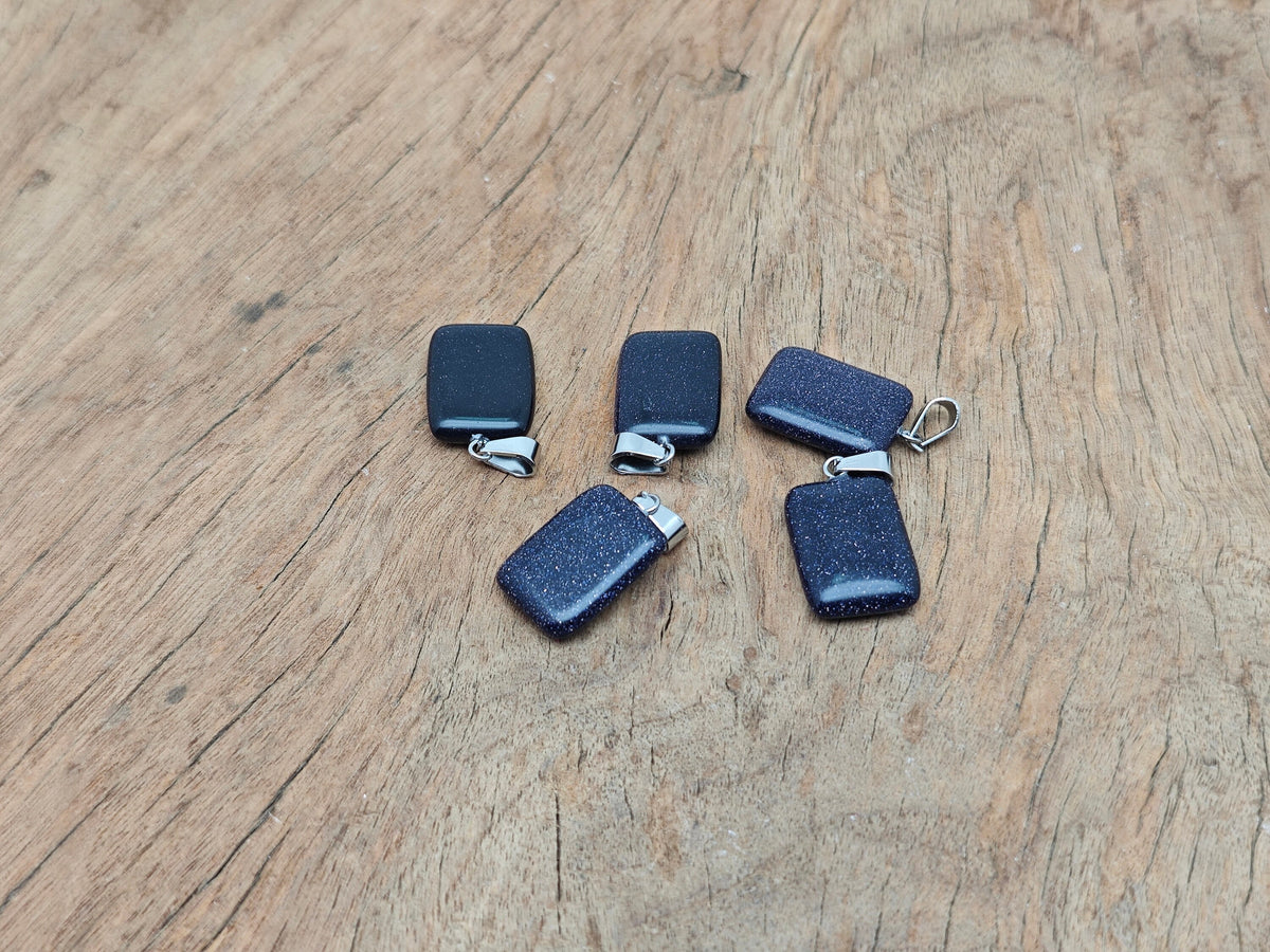 Blue Goldstone rectangle gemstone pendant from GemstoneGO, showcasing a sparkling blue and gold-colored crystal in a rectangular shape.