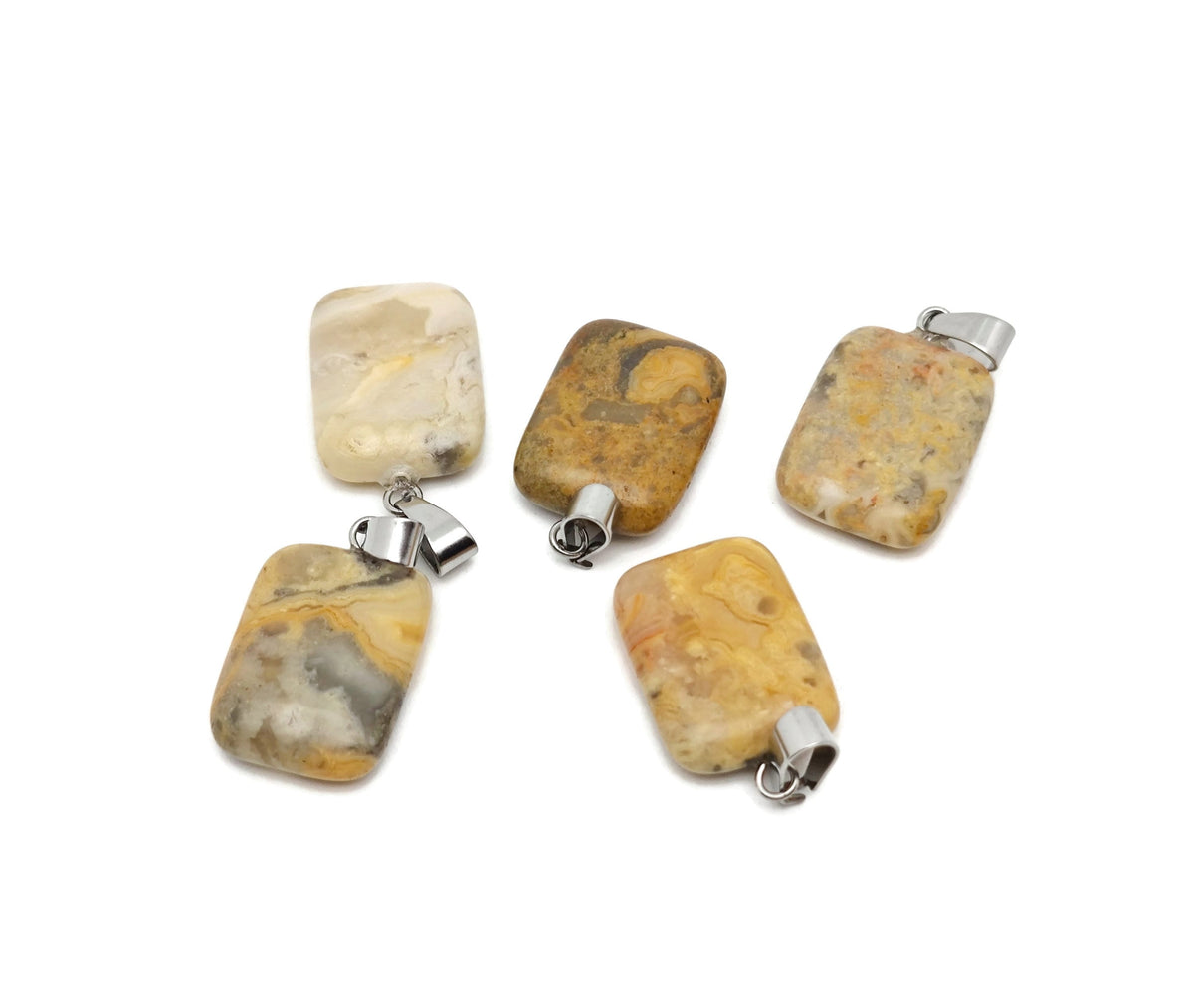 Rectangle-shaped Crazy Lace Agate crystal pendant from GemstoneGO, showcasing vibrant, intricate gemstone details.