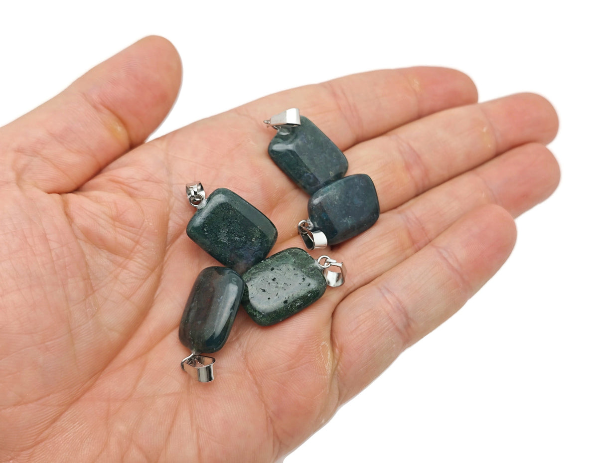 Rectangular moss agate crystal pendant from GemstoneGO, showcasing natural green and brown gemstone with polished surface.
