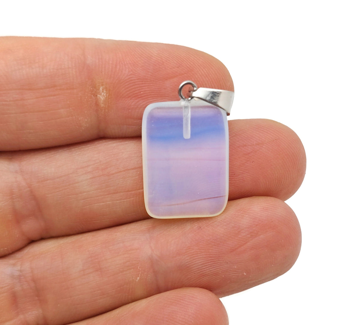 Opalite rectangle crystal pendant from GemstoneGO, showcasing a smooth, polished gemstone with a sleek rectangular shape.