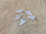 Rose quartz triangle crystal pendant from GemstoneGO, showcasing a smooth, polished pink gemstone in a triangle shape.