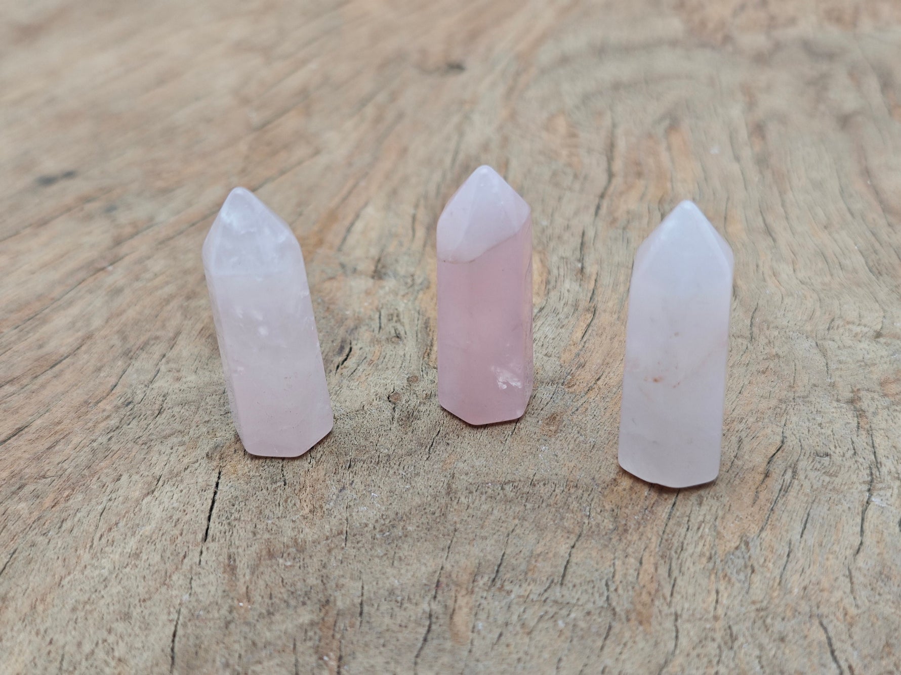Rose quartz obelisk tower crystal, 40mm gemstone with pink translucent appearance, from GemstoneGO.