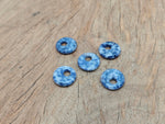 Sodalite crystal donut pendant, 18mm Pi Stone from GemstoneGO, showcasing deep blue and white natural mineral patterns.