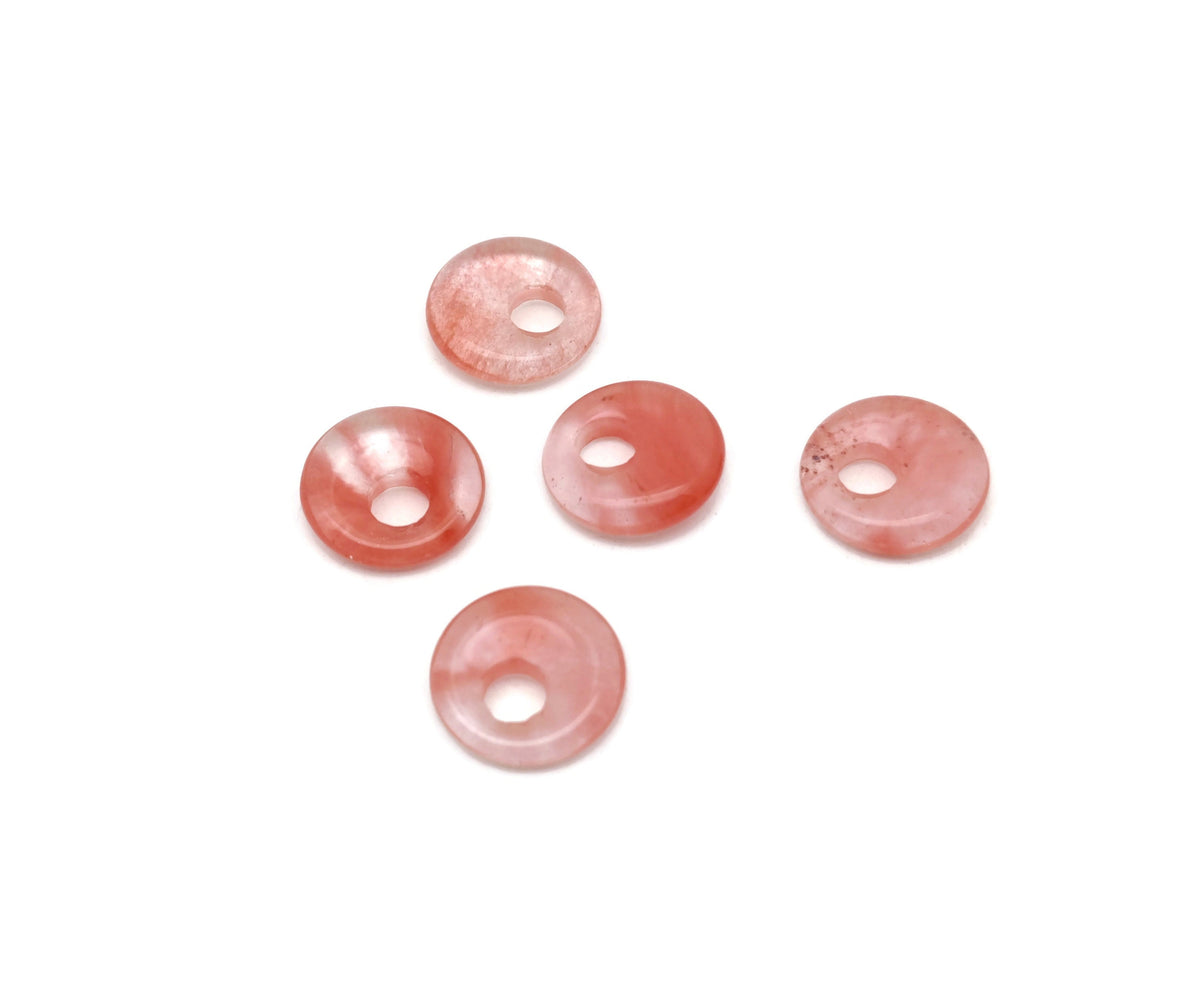 Cherry Quartz crystal donut pendant, 18mm Pi Stone by GemstoneGO, showcasing the vibrant red and pink hues of the gemstone.