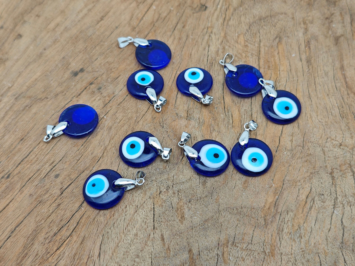 Glass evil eye pendant from GemstoneGO featuring vibrant blue and white colors, perfect for gift jewelry or protective accessories.