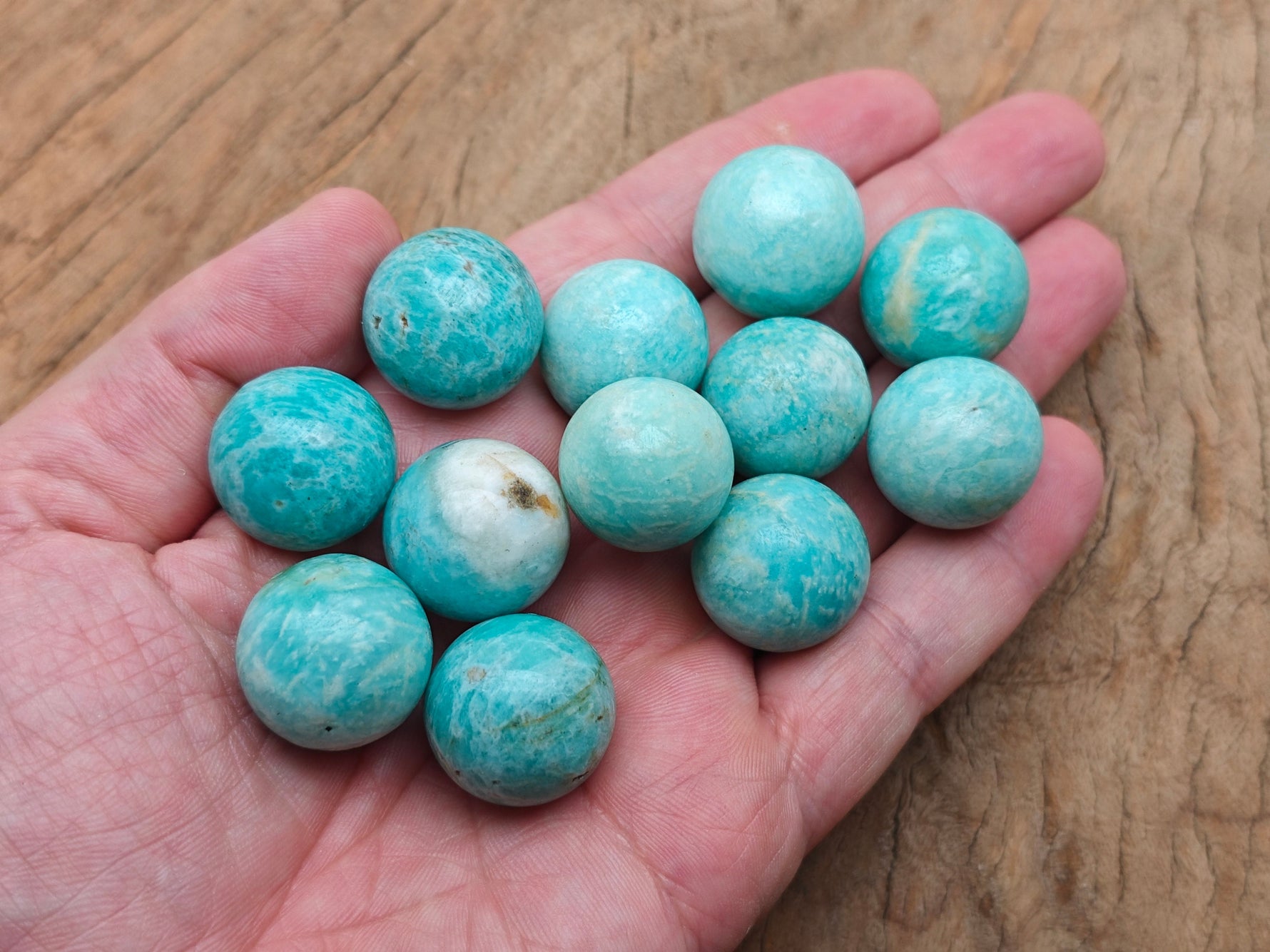 20mm Amazonite gemstone sphere, smooth crystal ball from GemstoneGO, showcasing vibrant blue-green mineral with natural patterns
