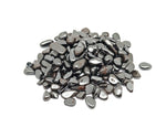 Semi-tumbled hematite crystal chips, 7-12mm, from GemstoneGO, shown in a close-up image of dark metallic stone chips.