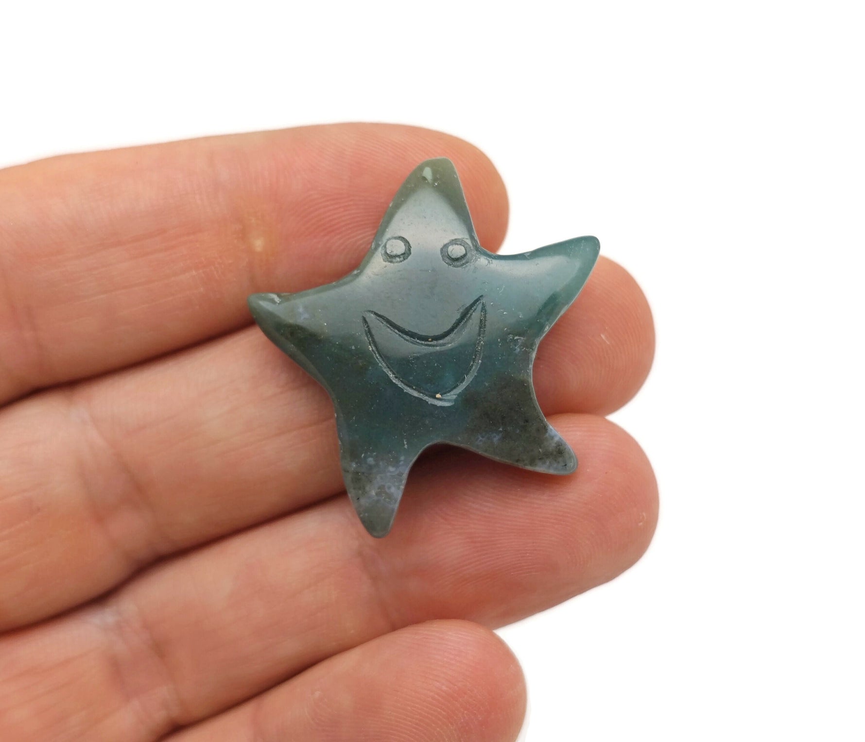 Mini gemstone star pendant from GemstoneGO, colorful crystal star for jewelry making and DIY craft projects.