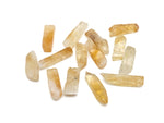 Citrine drilled tumbled gemstone pendant from GemstoneGO, showcasing a bright yellow, polished stone with a natural drilled hole.