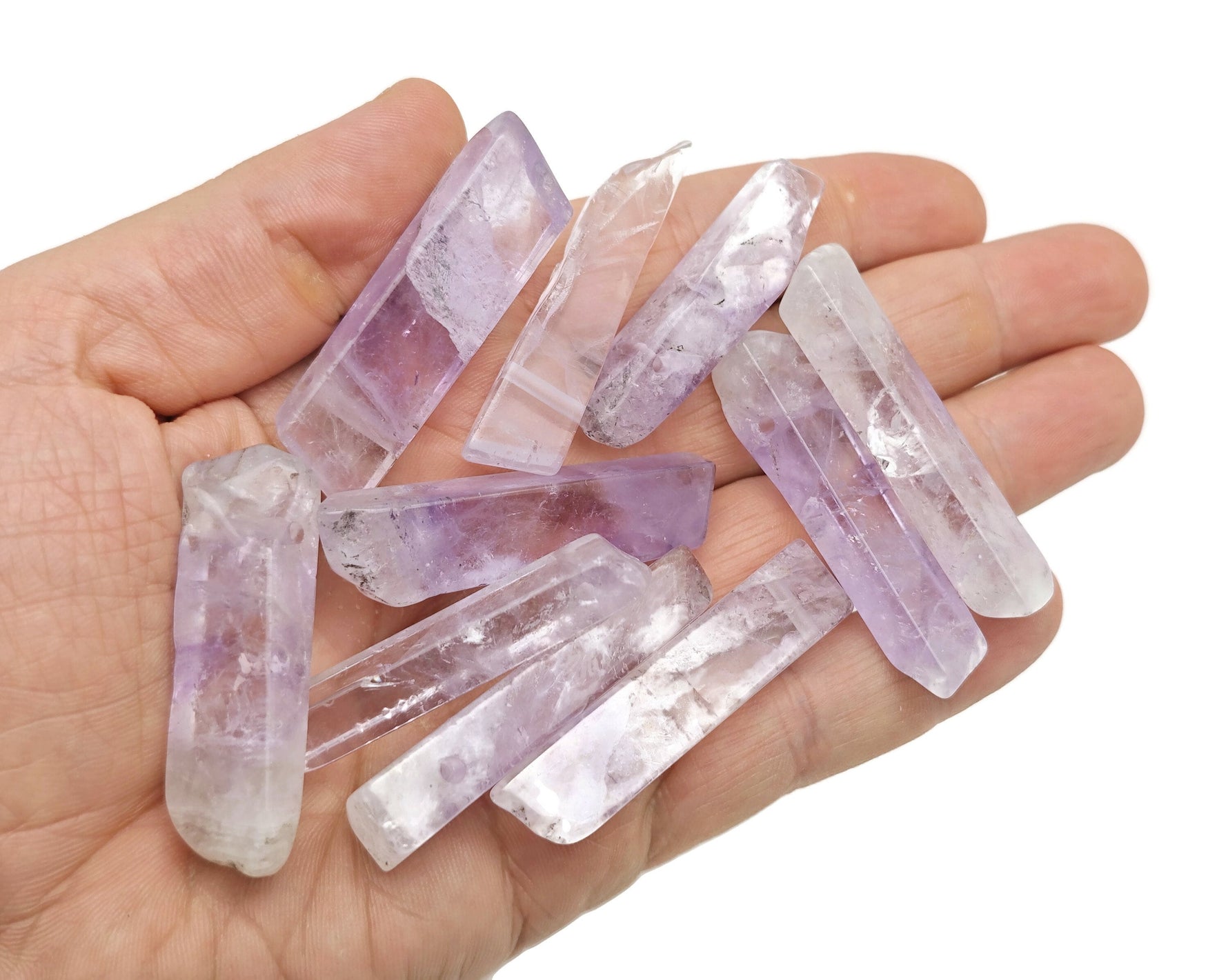 Amethyst drilled tumbled gemstone pendant from GemstoneGO, showcasing a polished purple amethyst stone with drilled hole for jewelry.