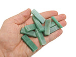 Aventurine drilled tumbled gemstone pendant from GemstoneGO, showcasing a smooth green stone with natural patterns and drill hole for jewelry.