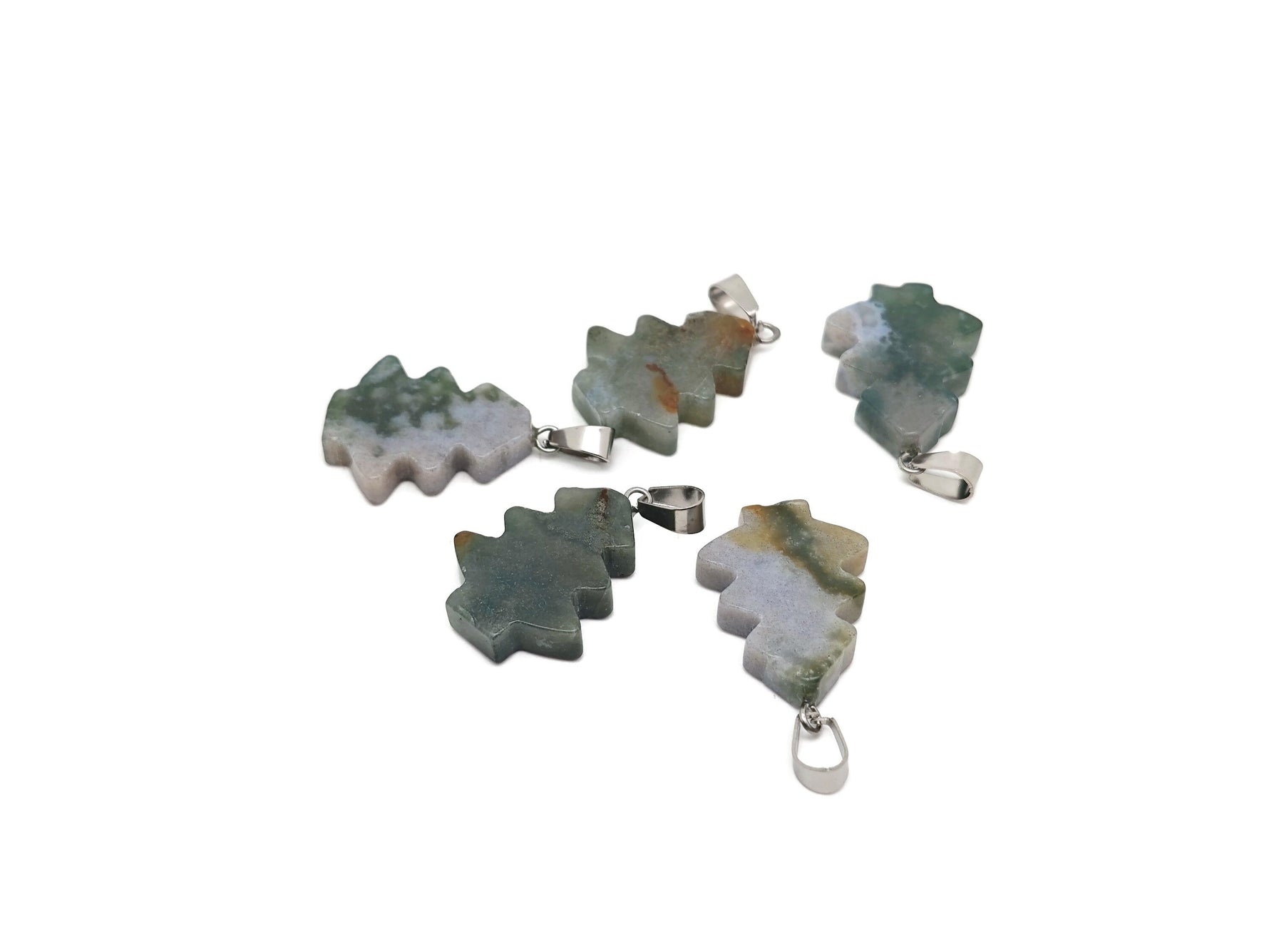 Moss agate gemstone pendant featuring a miniature pine tree design, natural crystal jewelry from GemstoneGO