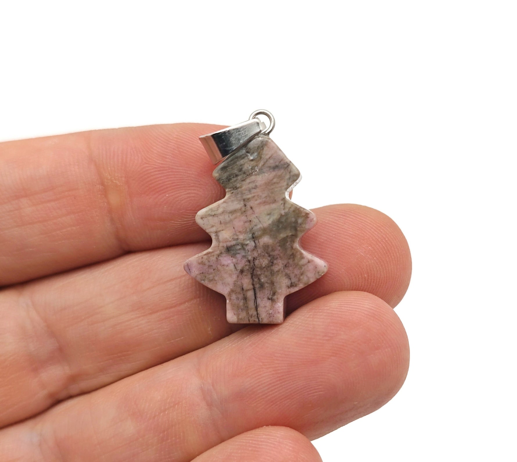 Rhodonite gemstone pine tree pendant with mini crystal design, featuring natural pink and black stone details, by GemstoneGO.