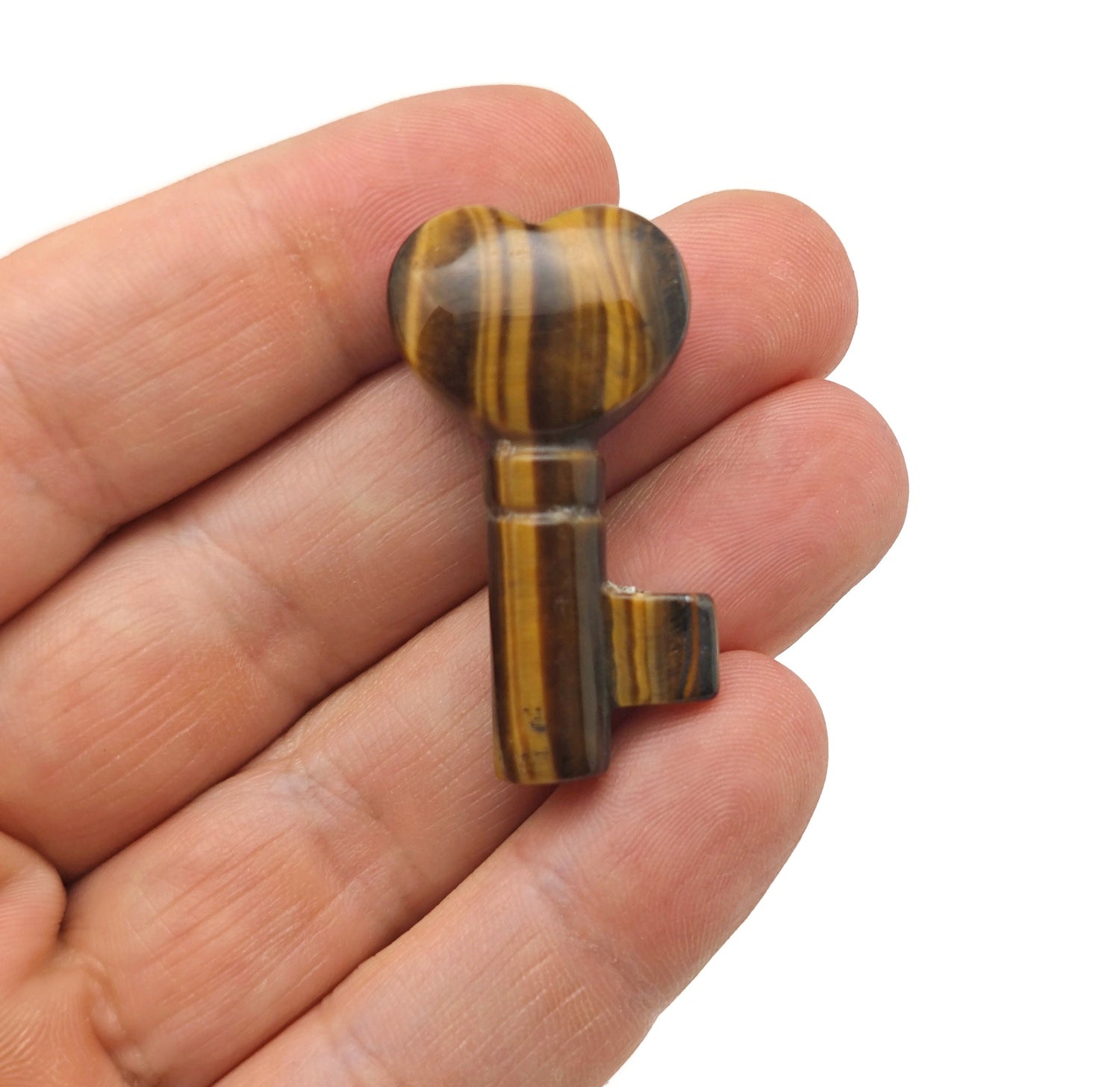 Tiger Eye gemstone carving key with 40mm size from GemstoneGO, featuring a polished, detailed tiger eye design.