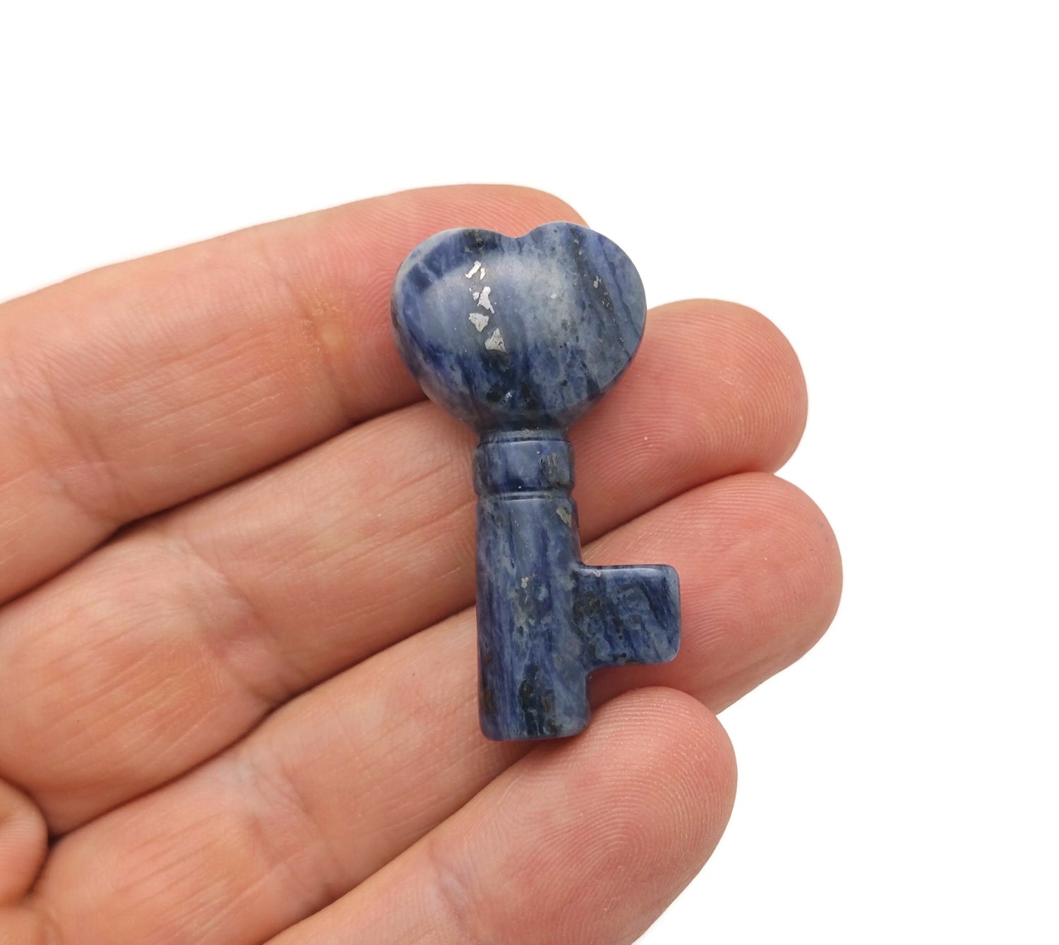 Sodalite gemstone key carving, 40mm, featuring intricate details and rich blue and white patterns, by GemstoneGO.