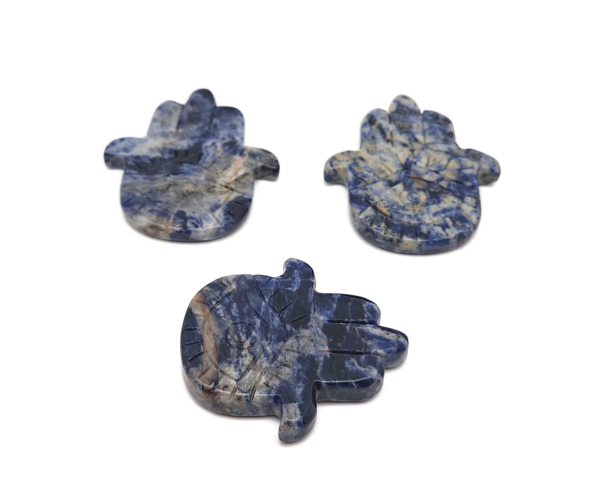Sodalite evil eye hand gemstone carving by GemstoneGO, detailed blue and white stone sculpture with protective evil eye design
