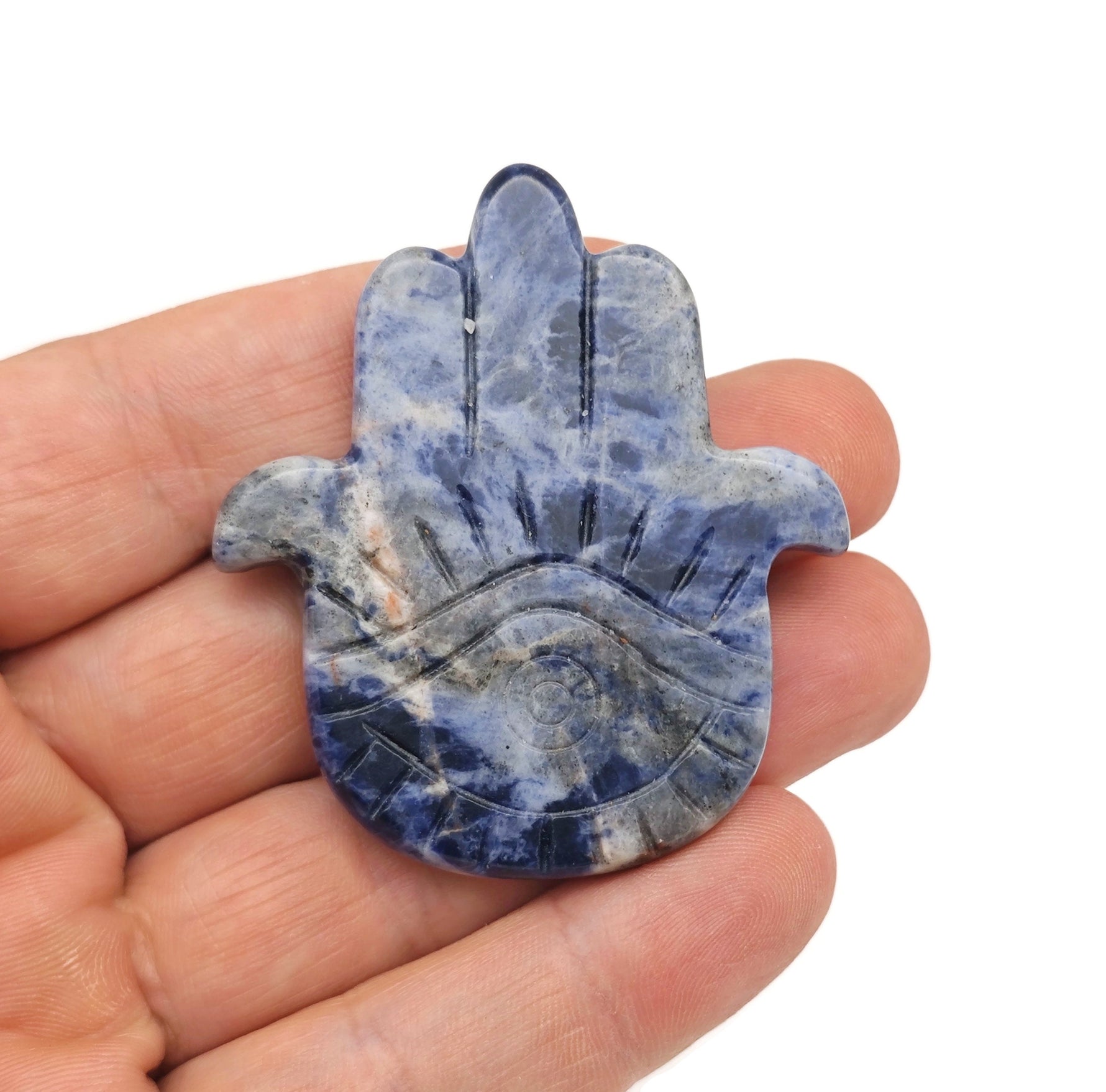 Sodalite evil eye hand gemstone carving by GemstoneGO, featuring detailed blue and white stone craftsmanship.