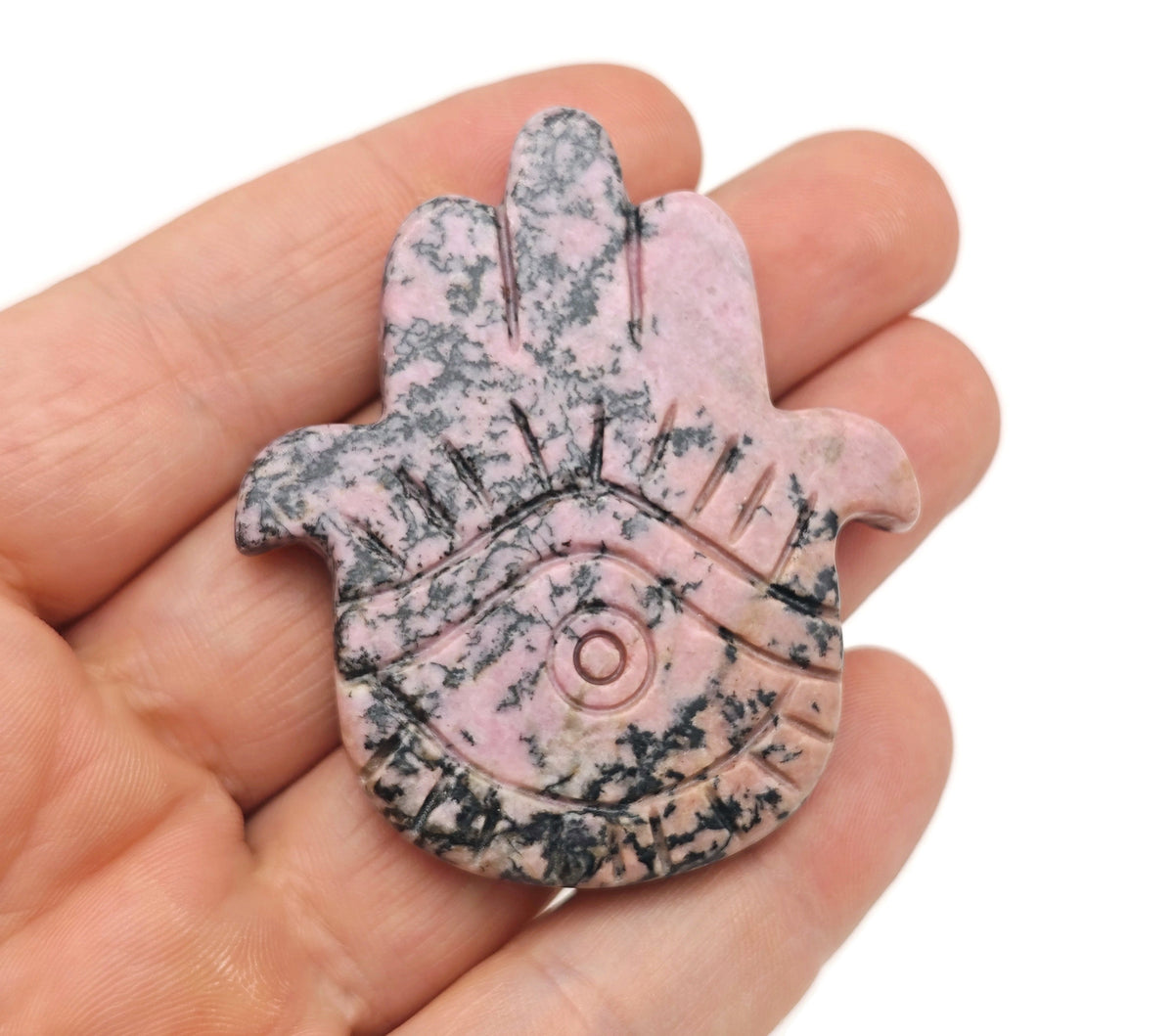 Rhodonite evil eye hand gemstone carving by GemstoneGO, detailed red and black stone sculpture with protective evil eye design.