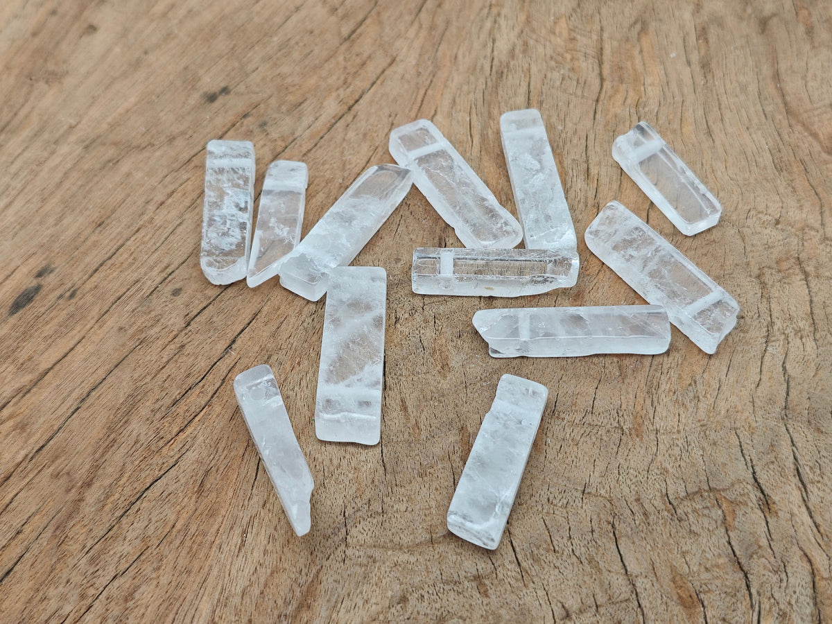 Clear quartz drilled tumbled gemstone pendant with rectangular hole, suitable for jewelry making, from GemstoneGO.