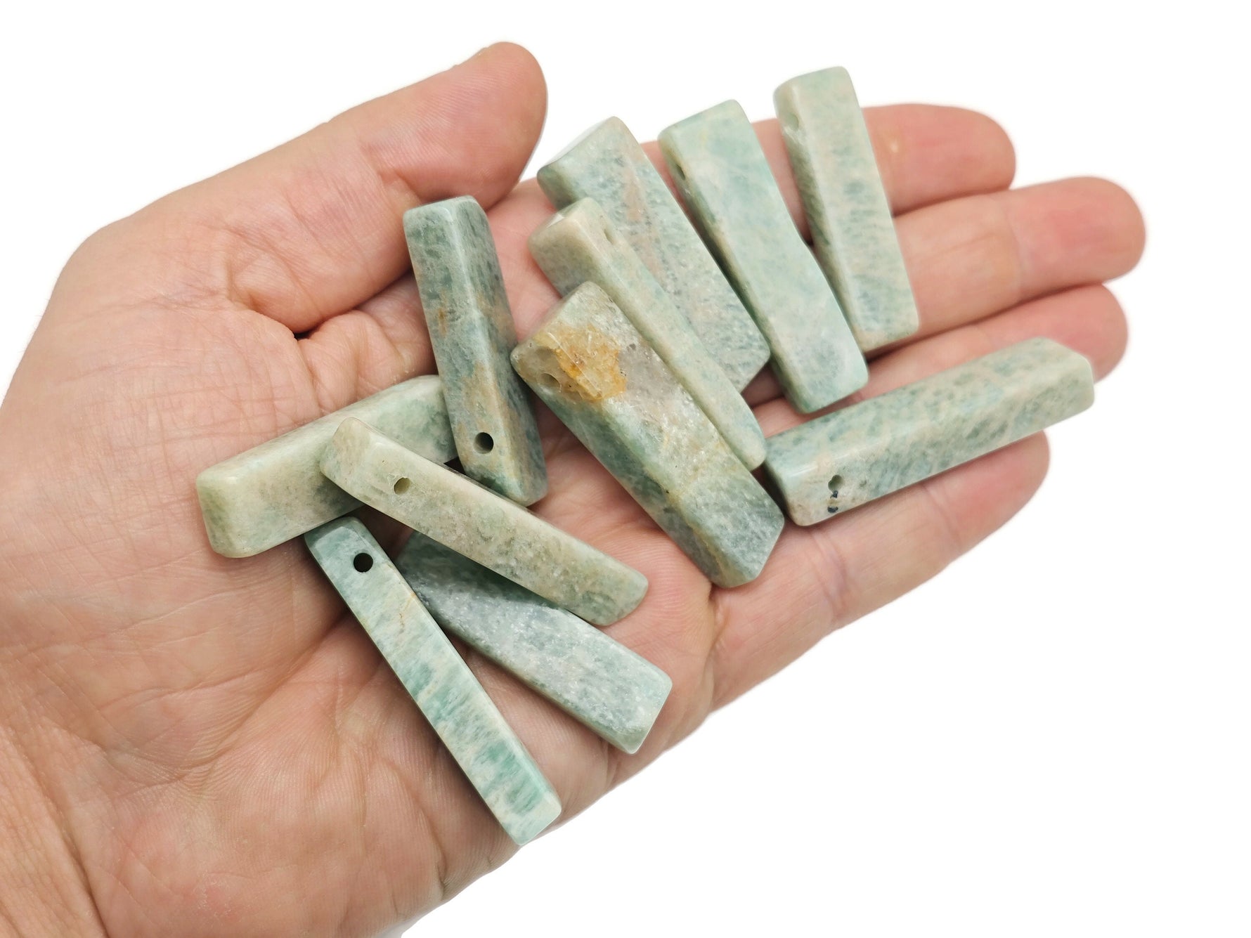 Rectangular Amazonite drilled tumbled gemstone pendant for jewelry making by GemstoneGO, showcasing a smooth, blue-green stone with a hole.