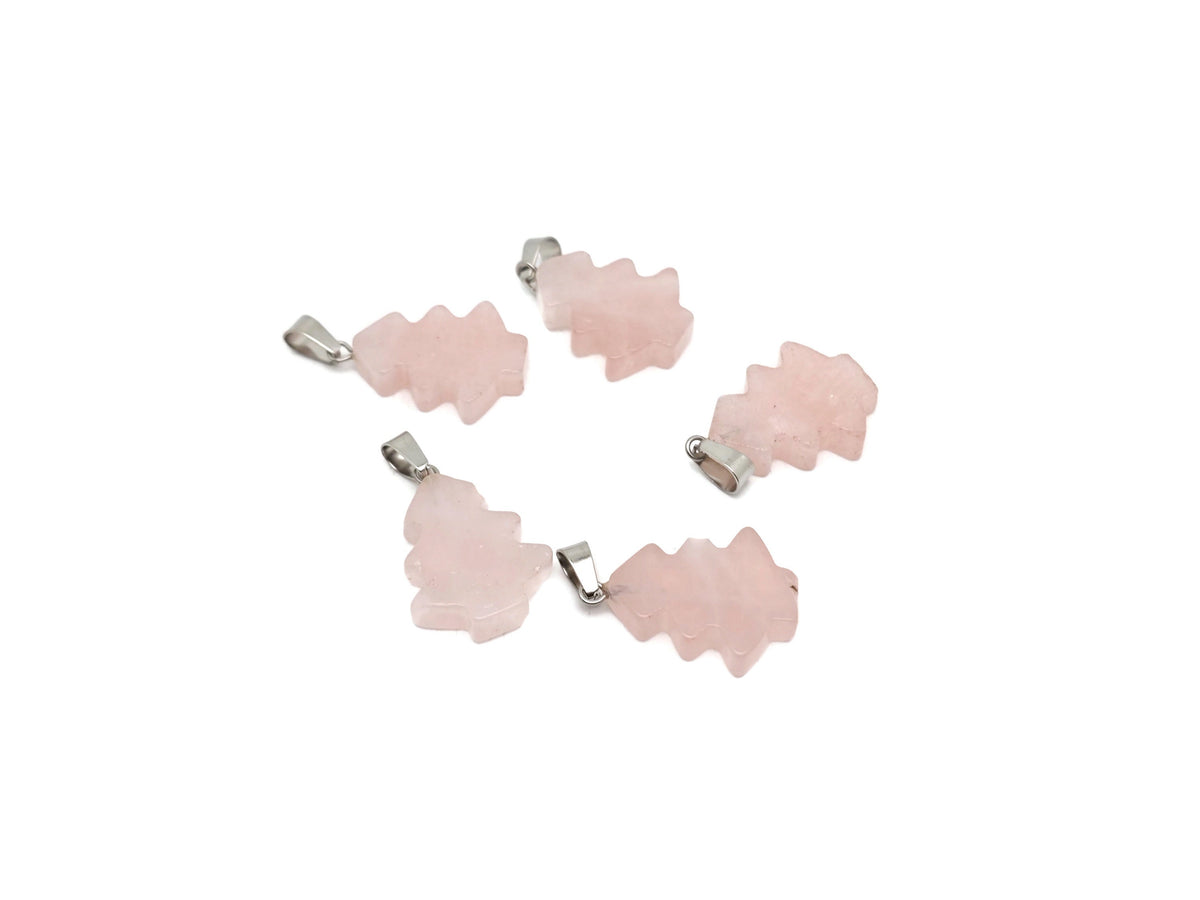 Mini rose quartz gemstone pine tree pendant by GemstoneGO, featuring a delicate crystal design on a silver chain.