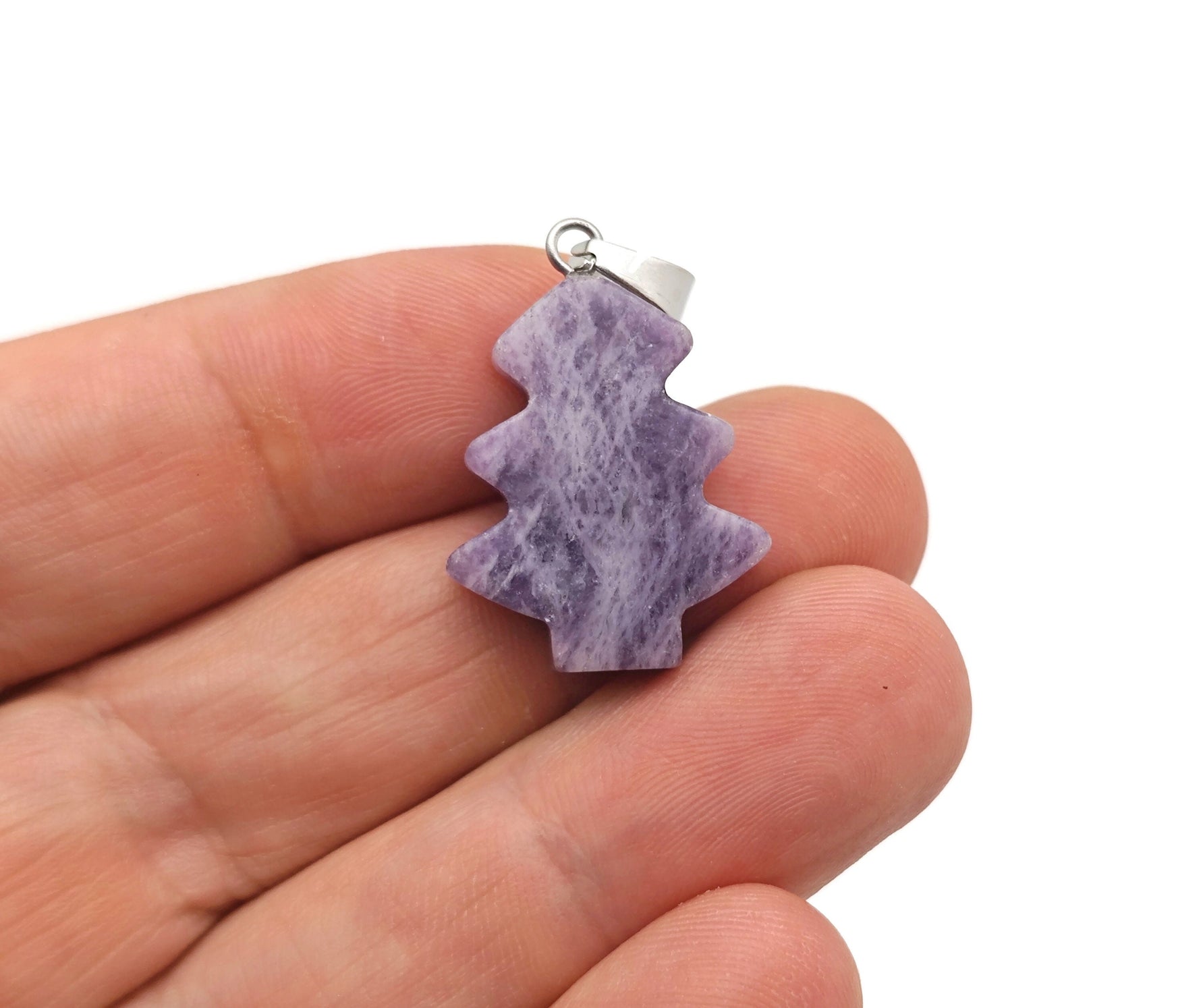 Mini Lepidolite pine tree gemstone pendant by GemstoneGO featuring a purple crystal gemstone on a silver chain.