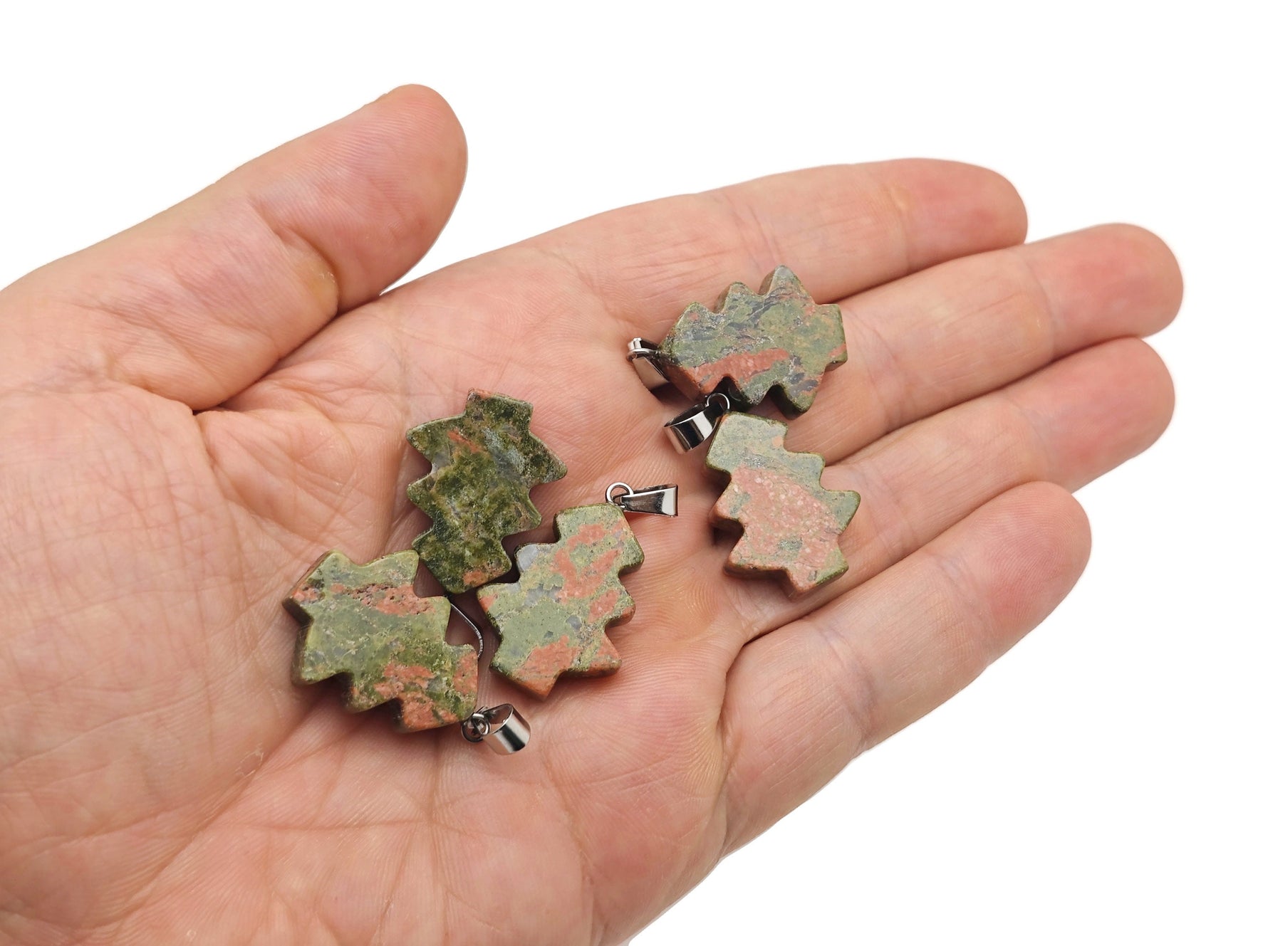 Unakite gemstone pine tree pendant hanging from a silver chain, mini crystal jewelry design, crafted by GemstoneGO.