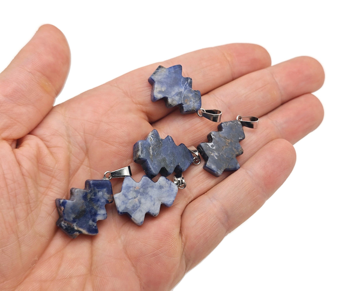 Mini sodalite gemstone pine tree pendant from GemstoneGO featuring a blue Sodalite crystal carved as a detailed pine tree.