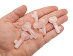 Rose Quartz key gemstone carving, 40mm, from GemstoneGO, featuring a detailed carved key shape in soft pink quartz.