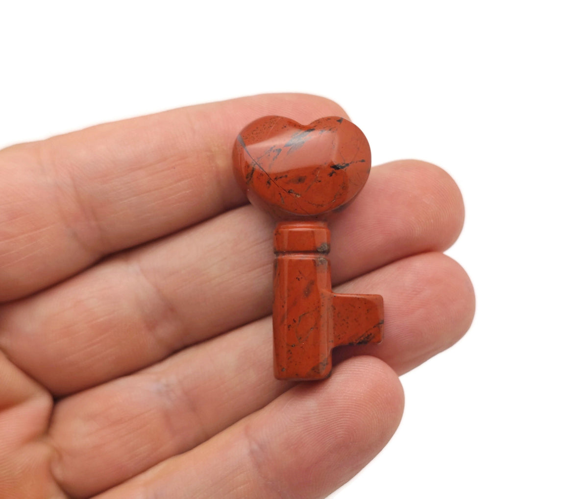 Red Jasper gemstone carving key, 40mm, from GemstoneGO, showing a polished and detailed red jasper key-shaped sculpture.