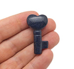 Blue Goldstone key gemstone carving, 40mm, from GemstoneGO, showing a detailed carved key with shimmering blue and gold hues.