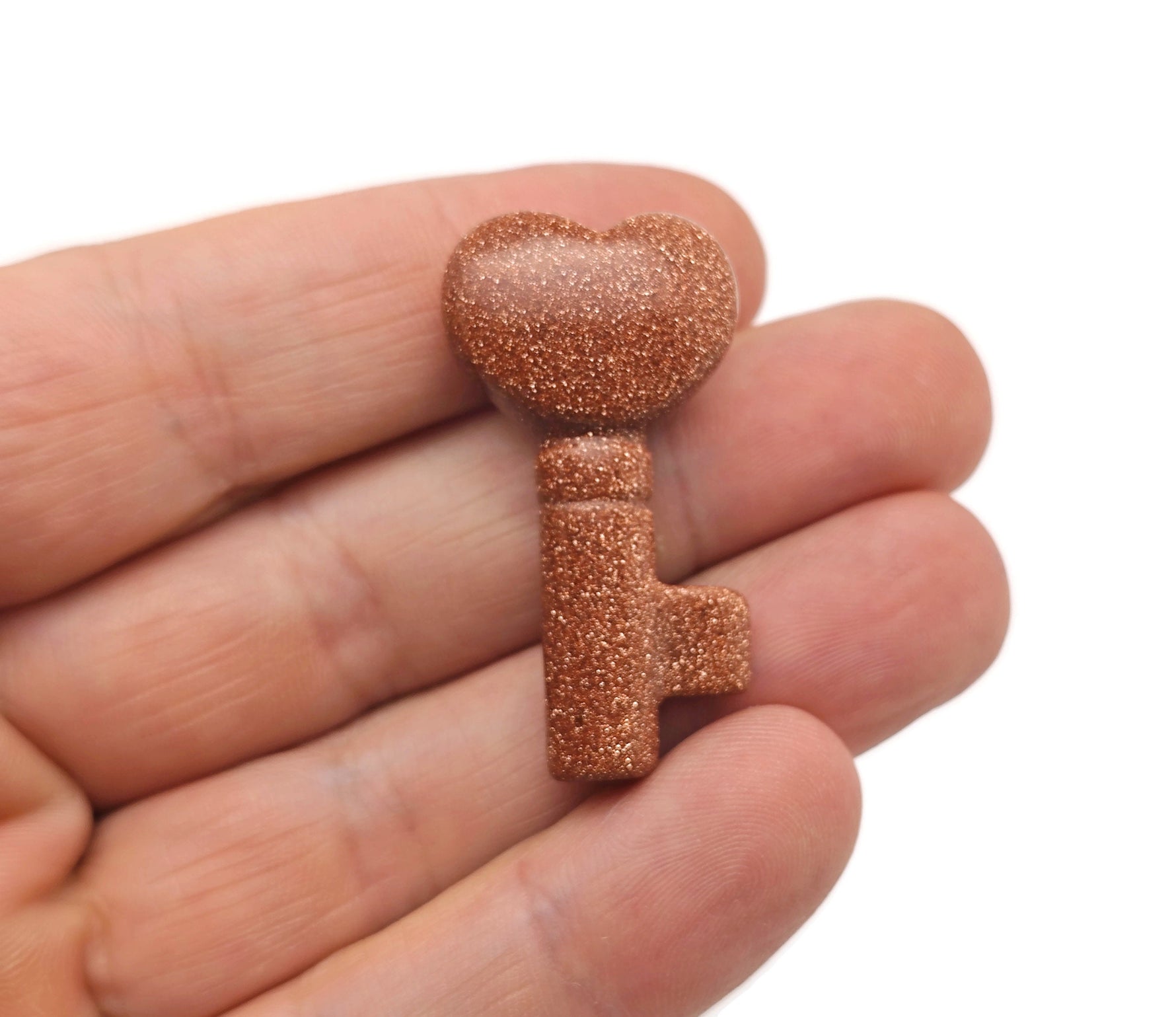 Goldstone key gemstone carving, 40mm, from GemstoneGO, featuring a detailed, polished design with shimmering gold accents