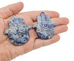 Sodalite evil eye hand gemstone carving with intricate details, crafted by GemstoneGO, showcasing vibrant blue and white stone patterns.
