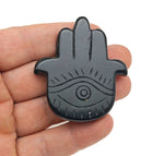 Obsidian Evil Eye hand-carved gemstone pendant from GemstoneGO, featuring intricate evil eye design on smooth black stone.
