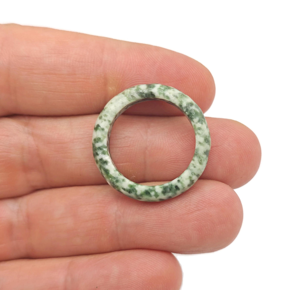 Green Jade Crystal Ring featuring a polished jade gemstone from Qinghai, set in a stylish jewelry design by GemstoneGO.