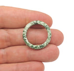 Green Jade Crystal Ring featuring a polished jade gemstone from Qinghai, set in a stylish jewelry design by GemstoneGO.