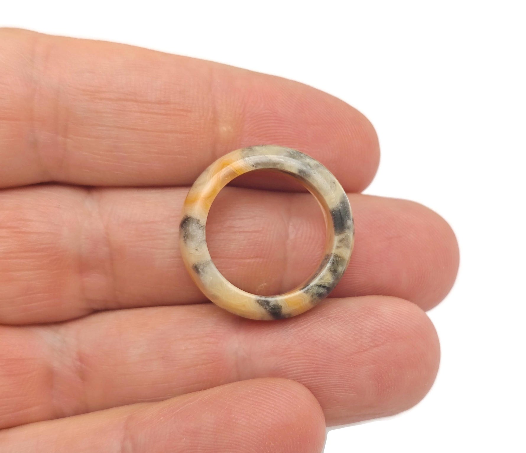 Crazy Lace Agate crystal ring by GemstoneGO featuring vibrant, banded gemstone on a silver-tone metal ring.