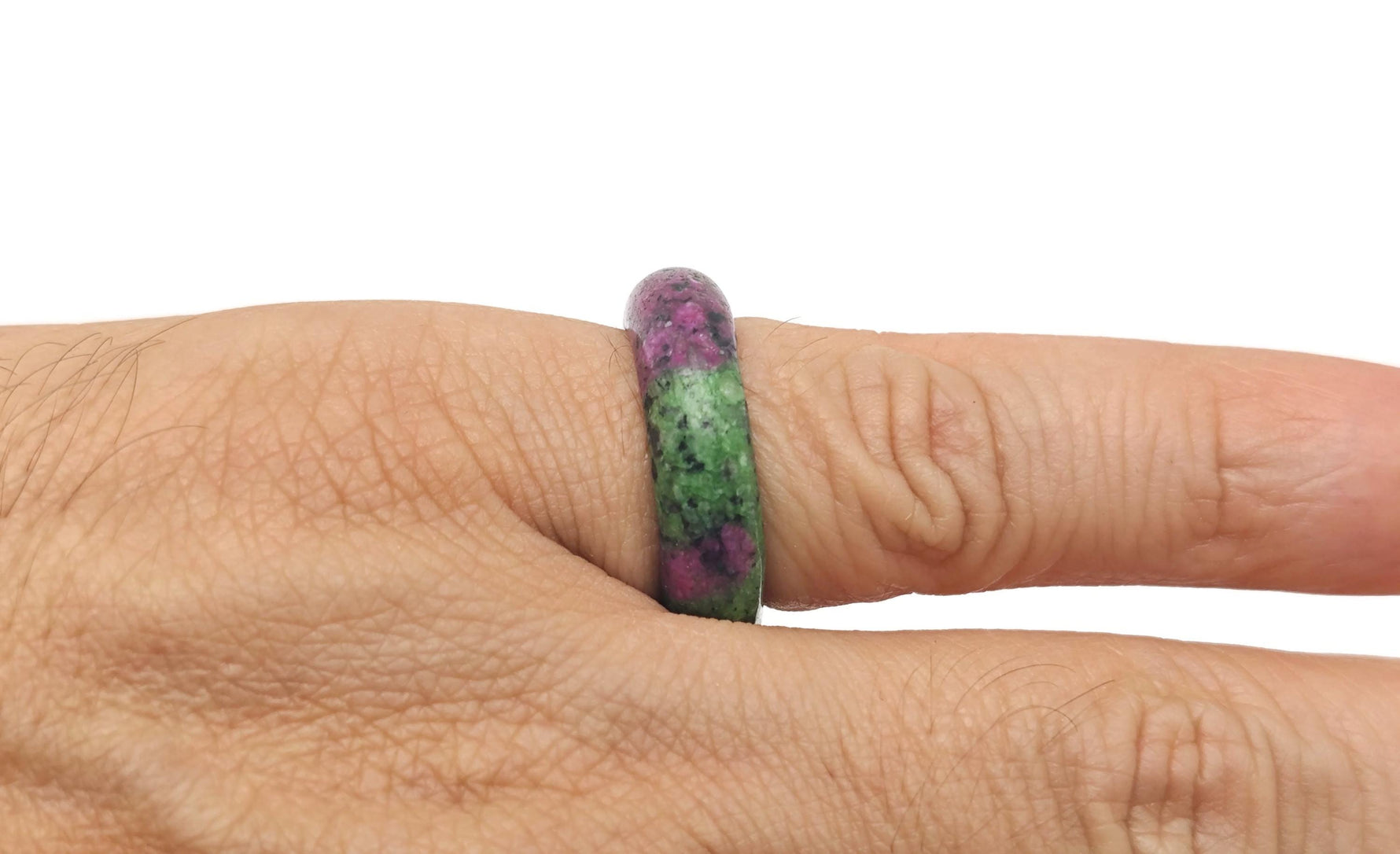 Ruby zoisite crystal ring by GemstoneGO featuring a vibrant, polished gemstone set in a silver band.