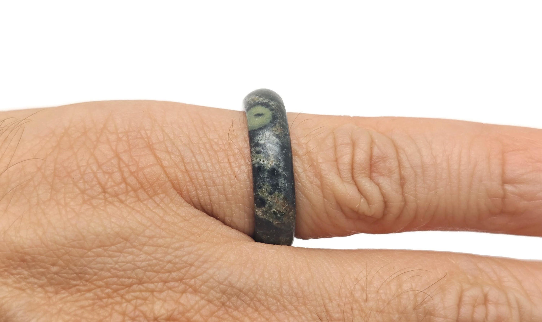 Kambaba Jasper crystal ring from GemstoneGO featuring a polished green and black patterned gemstone set in a silver band.