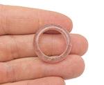 Strawberry quartz crystal ring by GemstoneGO featuring a polished pink gemstone set in a silver band.