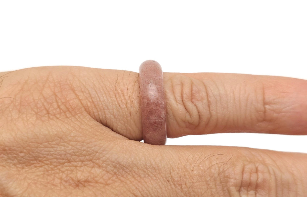 Strawberry Quartz Crystal Ring by GemstoneGO featuring a vibrant pink gemstone set in a silver band.