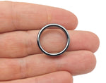 Hematite crystal ring by GemstoneGO featuring a smooth, polished hematite stone set in a sleek silver band.